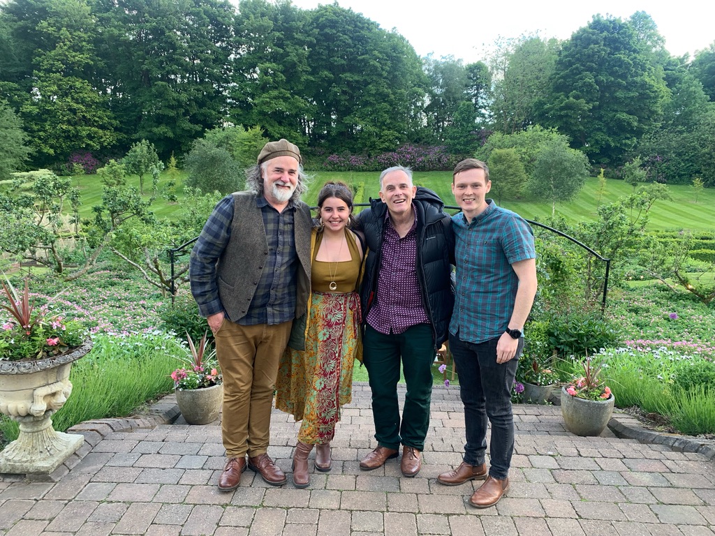 The four members of KIN together in a garden